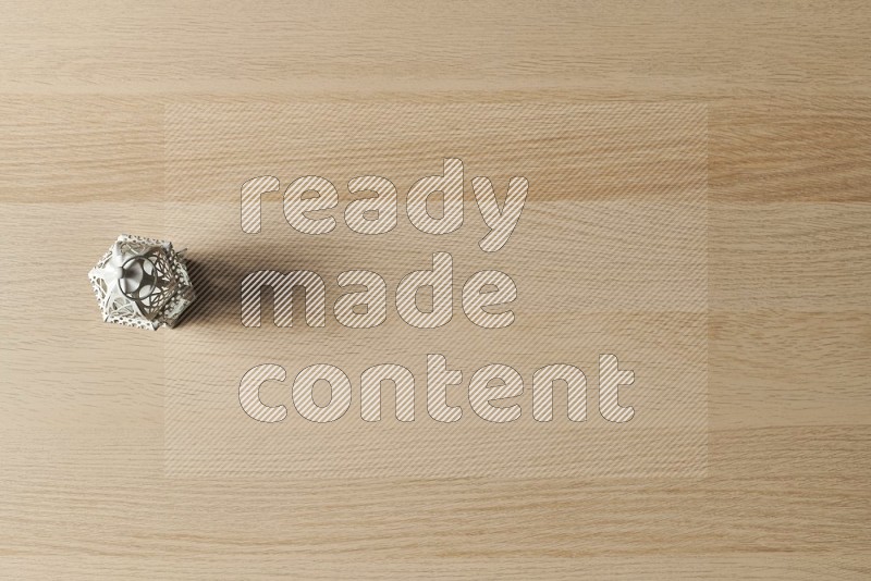 Top View Shot Of A Candle Lantern on Oak Wooden Flooring