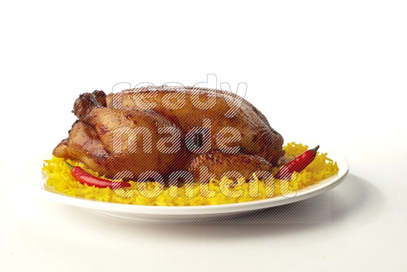 yellow  basmati Rice with  whole roasted chicken on a white rounded plate direct on white background