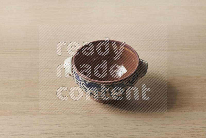 Multicolored Pottery Pot on Oak Wooden Flooring, 45 degrees