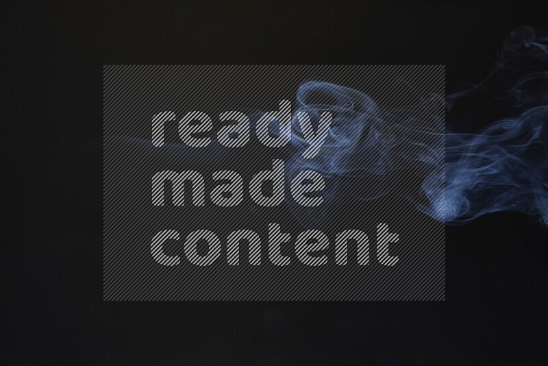 Motion of wavy smoke isolated on dark background