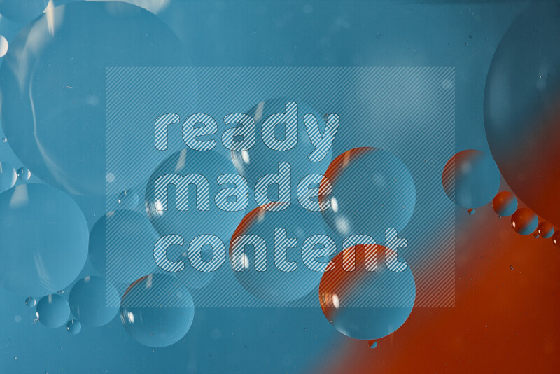 Close-ups of abstract oil bubbles on water surface in shades of blue and orange