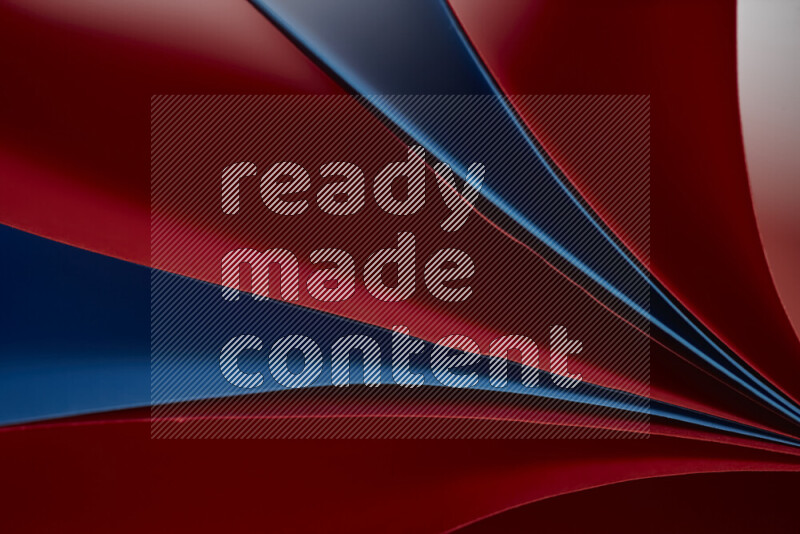 فن تجريدي يعرض المنحنيات المرتبة للأوراق باللون الأحمر والأزرق