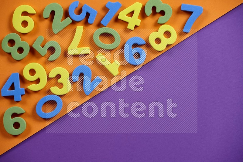 Foam numbers for kids on orange and purple background (kids toys)