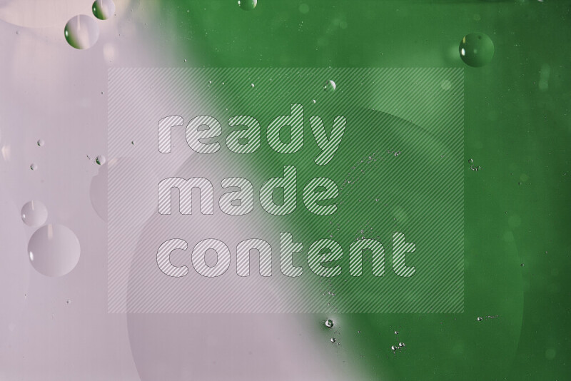 Close-ups of abstract oil bubbles on water surface in shades of white and green