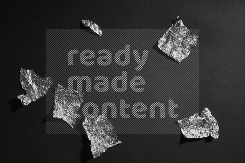 Aluminium foil on black background
