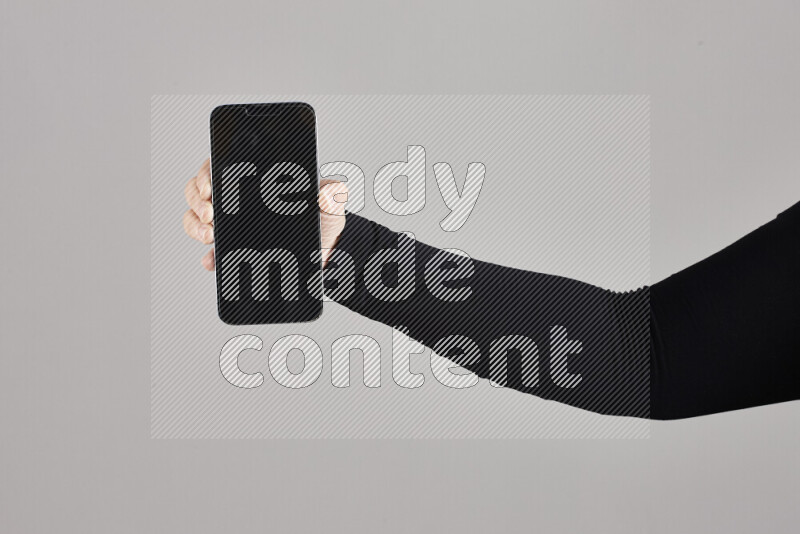 Woman hands holding different mobile phones in different positions