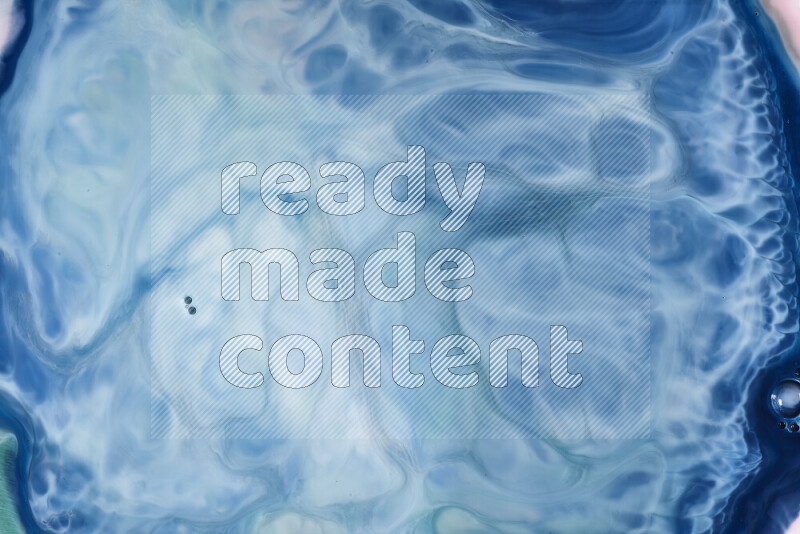 لقطة مقربة لأنماط دوامية باللون الأزرق والأبيض