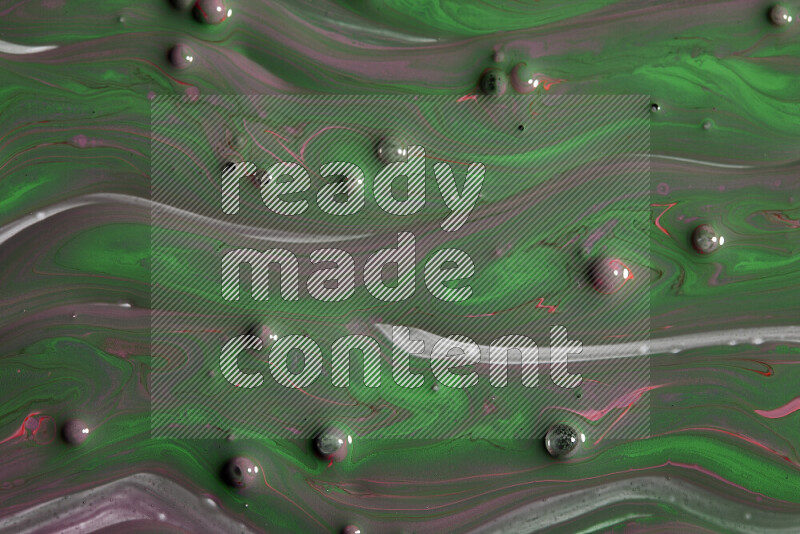 Abstract colorful background with mixed of purple and green paint colors