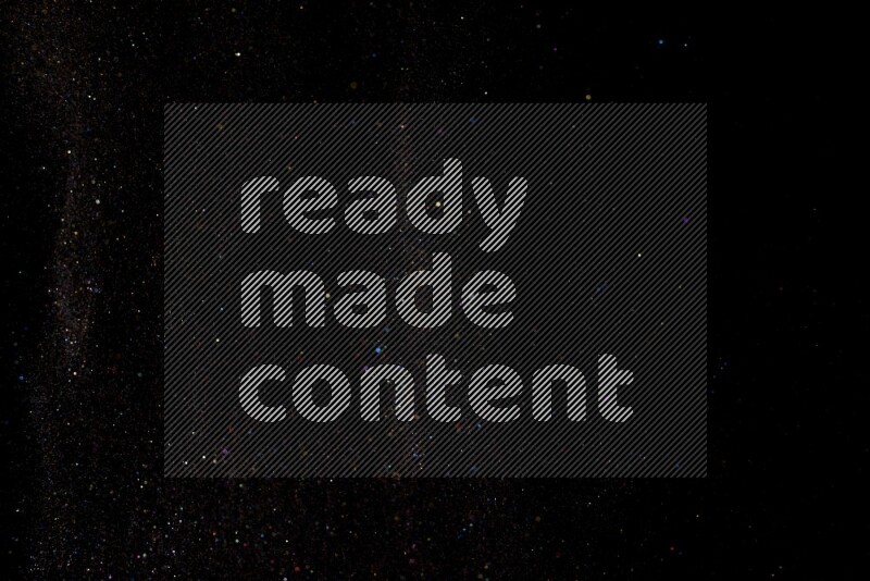 Multicolored glitter powder isolated on black background