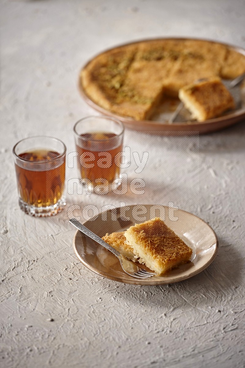 Konafa with tea in a light setup