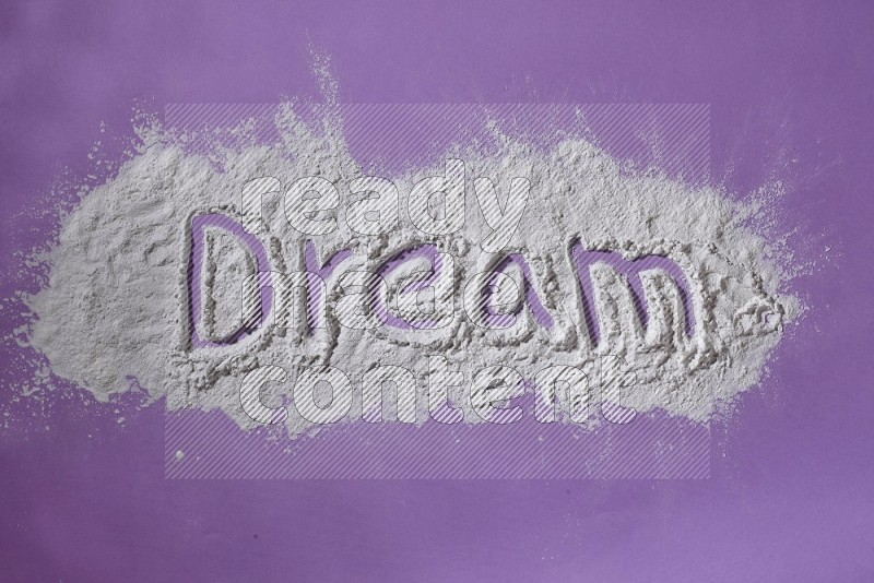 A word written with powder on purple background