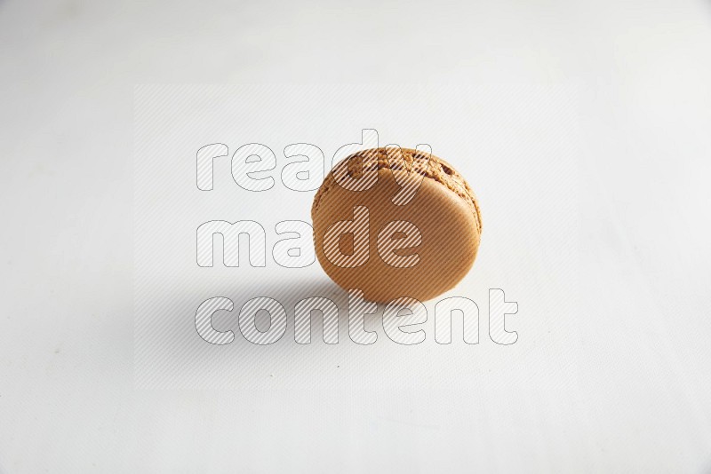 45º Shot of Brown Maple Taffy macaron on white background