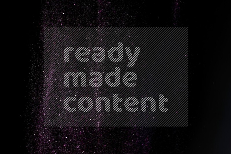 Pink glitter powder isolated on black background