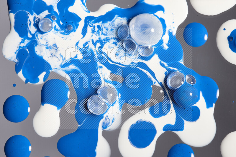 Abstract colorful background with mixed of white and blue paint colors