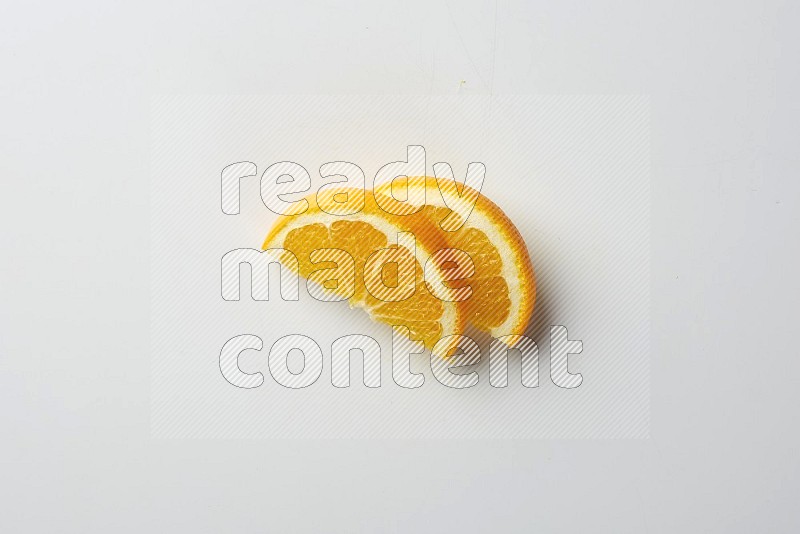Two halves of an orange slices on white background
