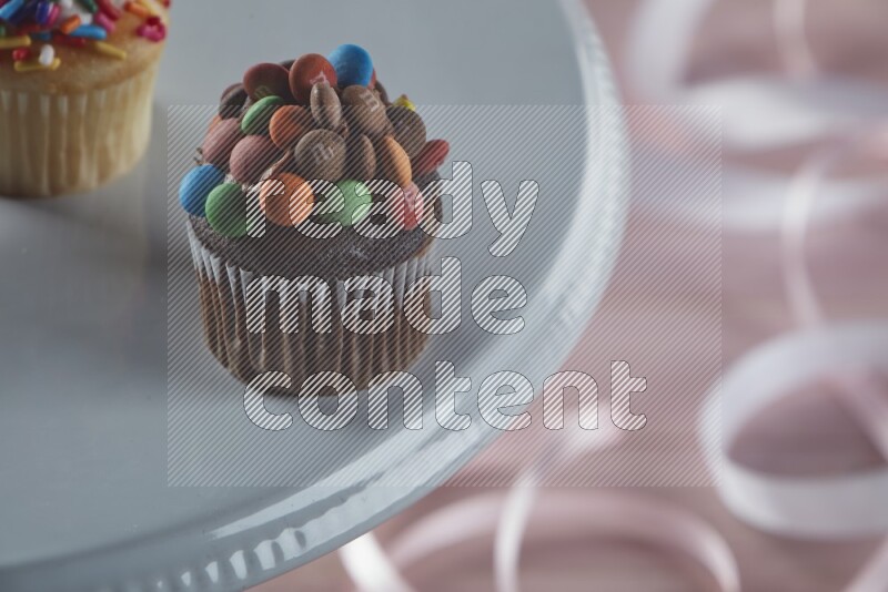 Chocolate mini cupcake topped with m&ms