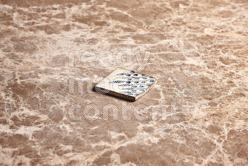 Pottery Coaster Tile on Beige Marble Flooring, 45 degrees