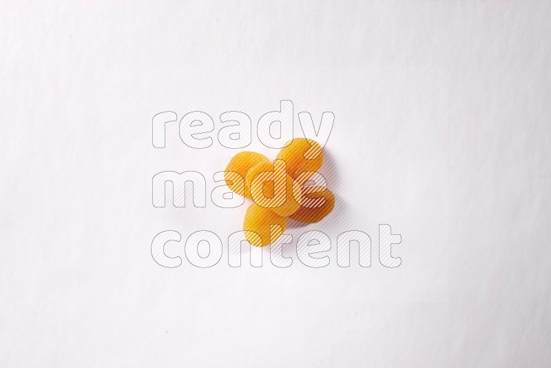 Dried apricots on white background