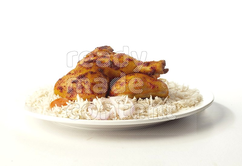 white  basmati Rice with  kabsa chicken pieces  on a white rounded plate direct on white background