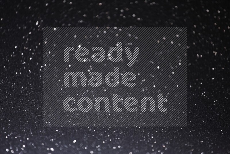 Black glittery bokeh background