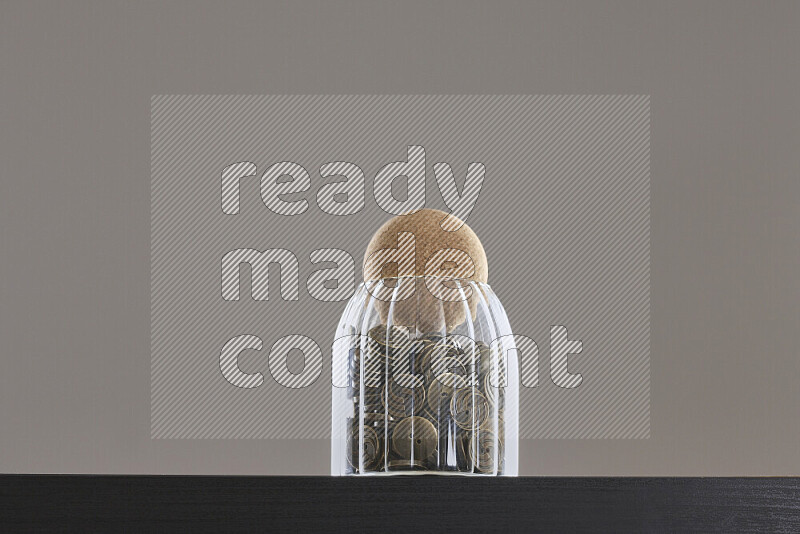 Buttons in a glass jar on black background