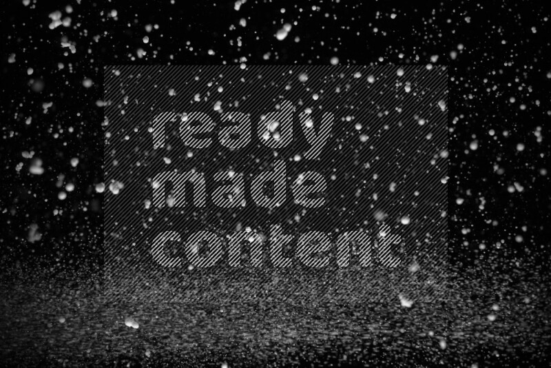 Snow spray on black background