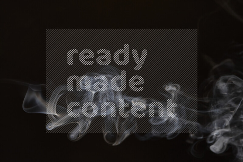 Motion of wavy smoke isolated on dark background