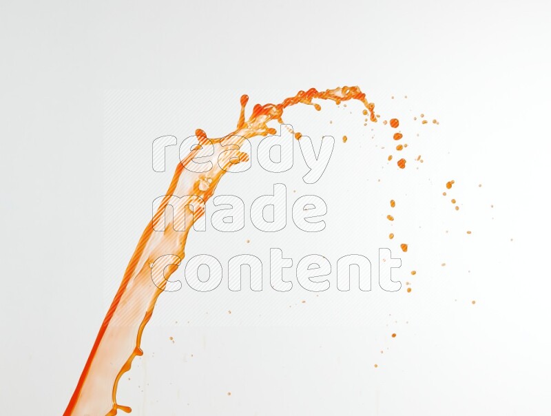 Orange liquid splash and drops on white background