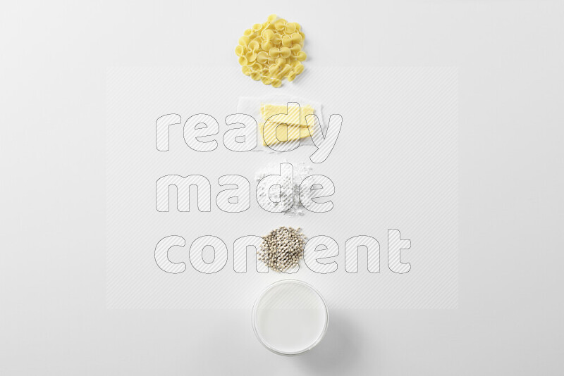 White sauce pasta recipes ingredients on white background