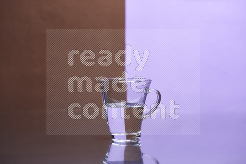 The image features a clear glassware filled with water, set against brown and light purple background
