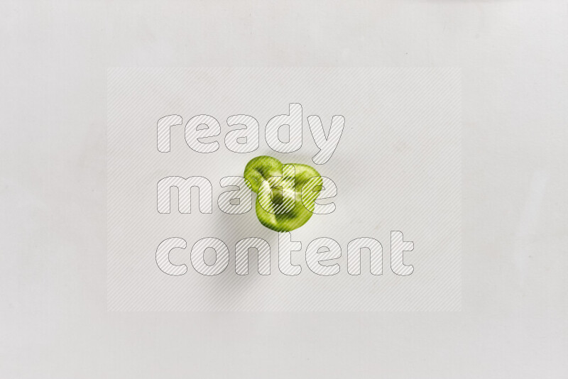 Green bell pepper slices on white background