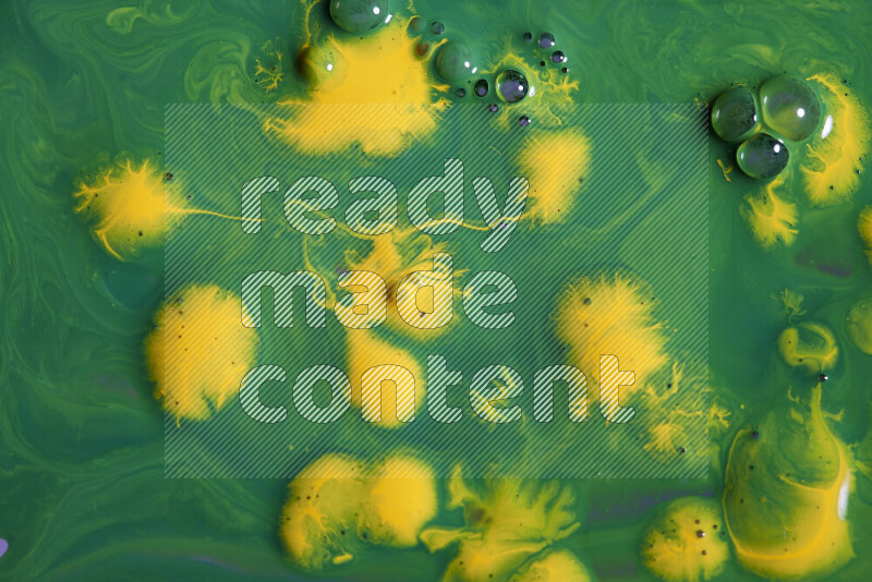 Abstract colorful background with mixed of green and yellow paint colors