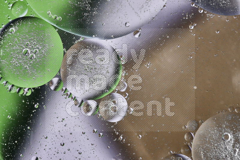 Close-ups of abstract oil bubbles on water surface in shades of brown, green and white