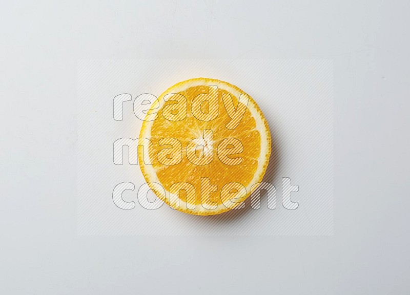A Single orange slice on white background