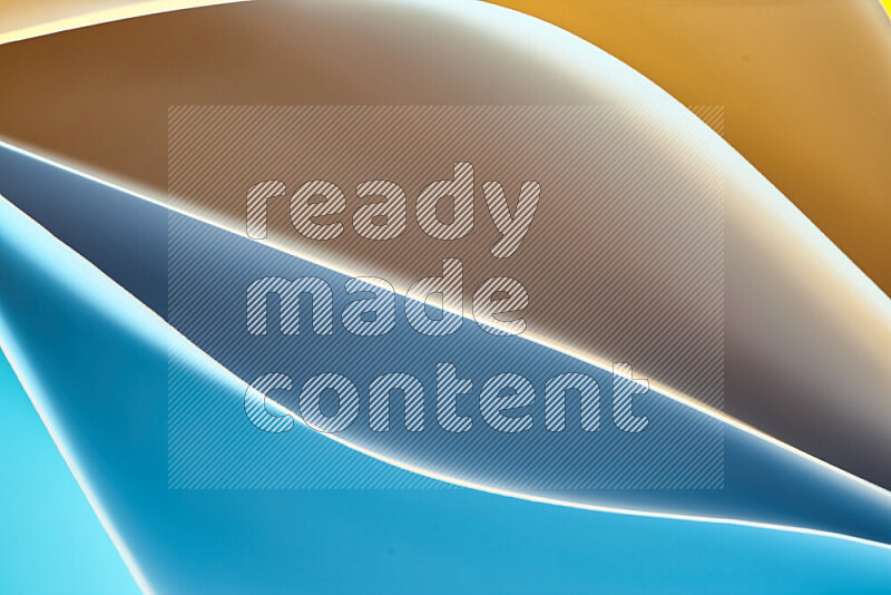 This image showcases an abstract paper art composition with paper curves in blue and orange gradients created by colored light