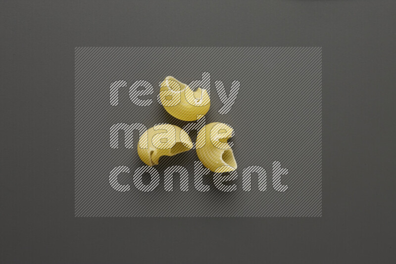 Pipe pasta on grey background