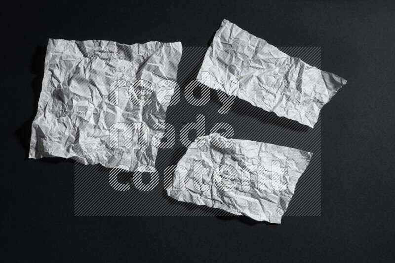 White paper sheet on black background