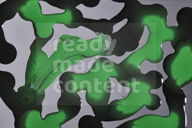 Abstract colorful background with mixed of green and black paint colors