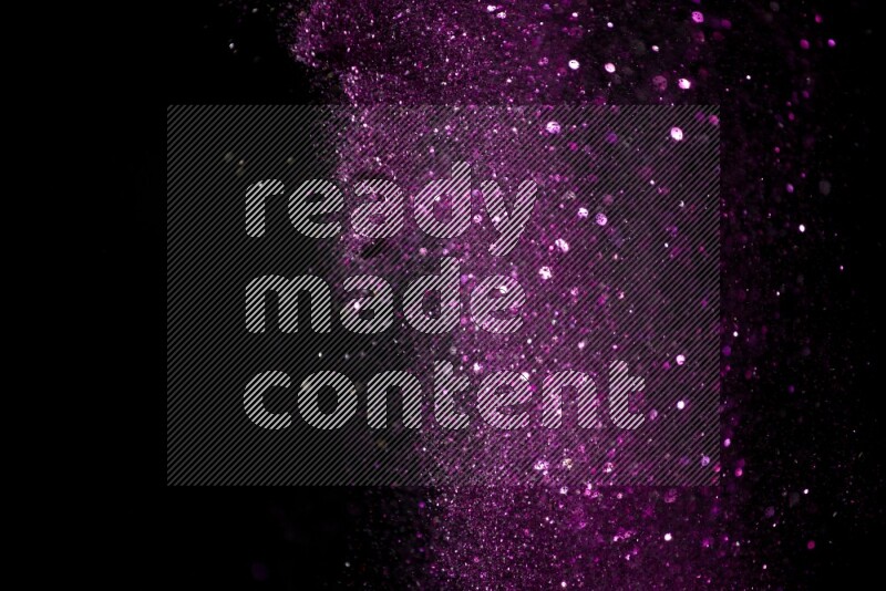Pink glitter powder isolated on black background