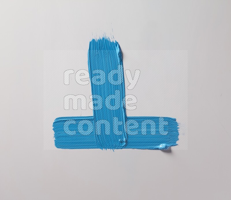 Multi blue straight brush strokes in different shapes on a white background