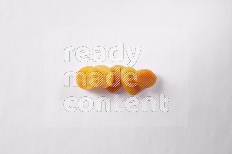Dried apricots on white background