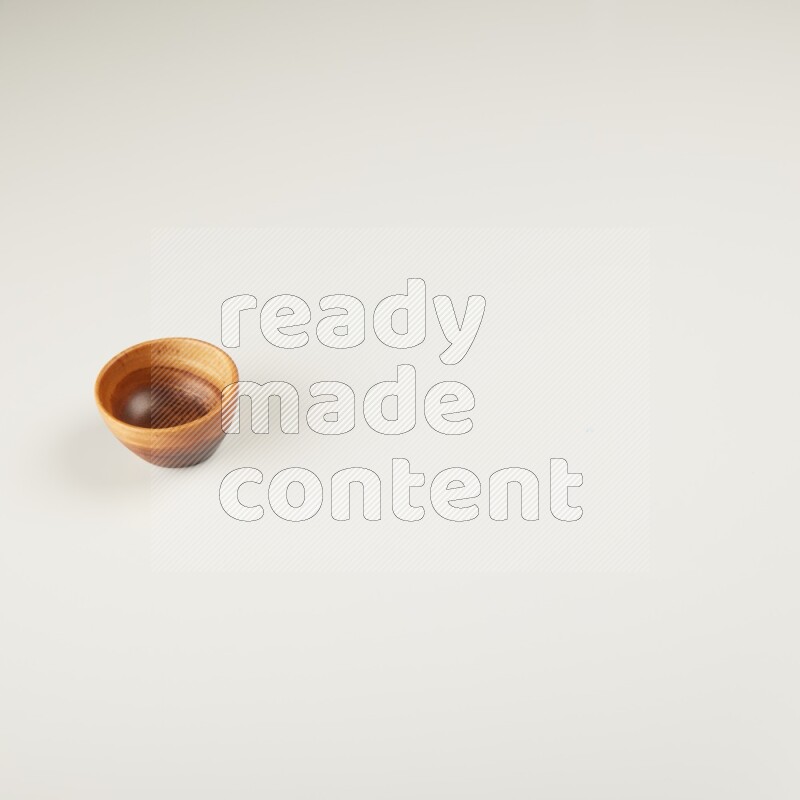 Wooden bowl on white background
