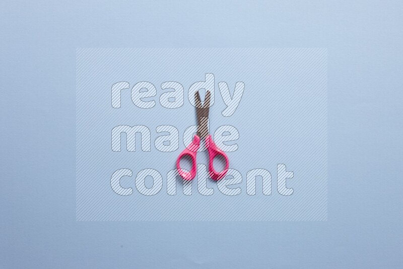 Different school supplies on blue background