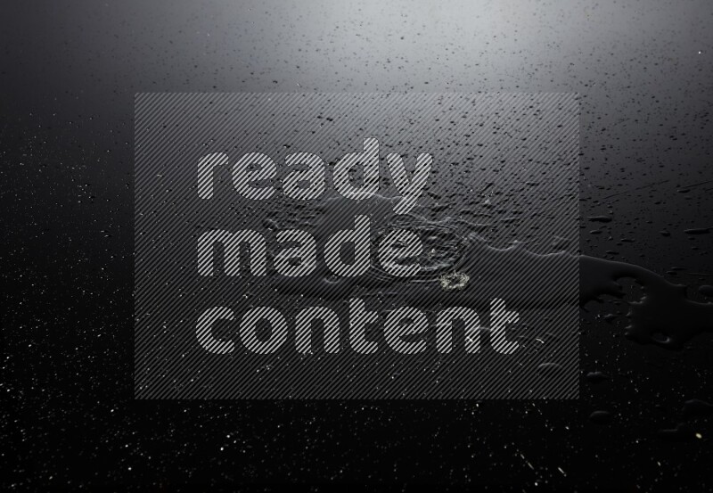 water drops, and droplets on black background