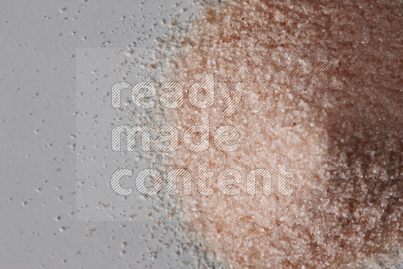 A bunch of fine himalayan salt on white background