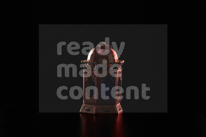 Ramadan lanterns with colored rim light against black background