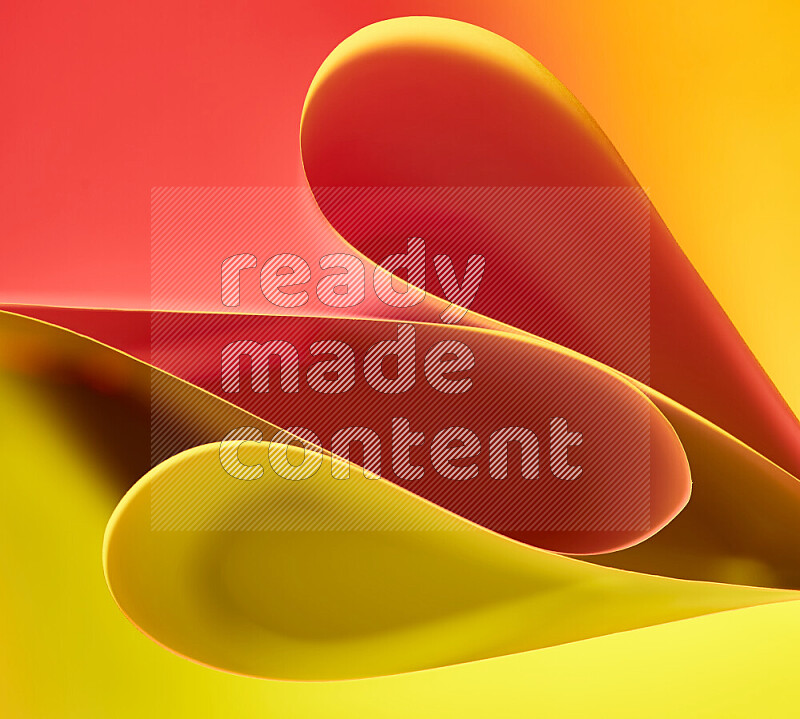 An abstract art of paper folded into smooth curves in yellow and red gradients