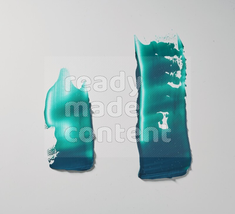 Turquoise painting knife strokes on white background