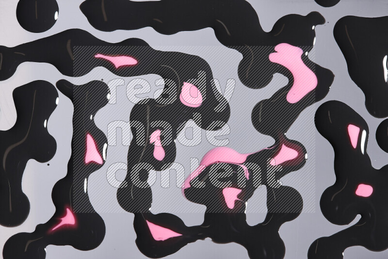 Abstract colorful background with mixed of pink and black paint colors