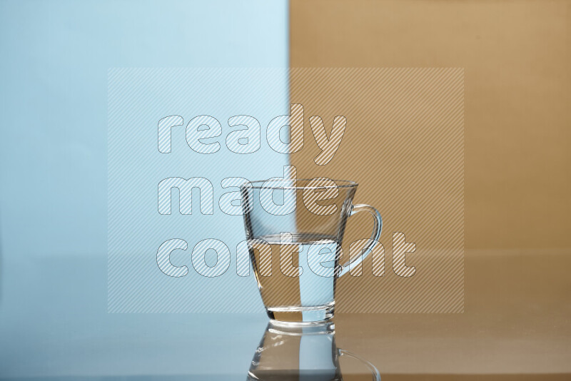 The image features a clear glassware filled with water, set against light blue and beige background